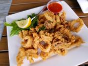 <p><strong>State Appetizer: Calamari </strong></p><p>Home to the biggest squid-fishing fleet on the East Coast, Rhode Island made this tasty app part of its <a href="https://www.sos.ri.gov/divisions/civics-and-education/reference-desk/ri-state-symbols" rel="nofollow noopener" target="_blank" data-ylk="slk:state official symbols in 2014;elm:context_link;itc:0;sec:content-canvas" class="link ">state official symbols in 2014</a>. </p>