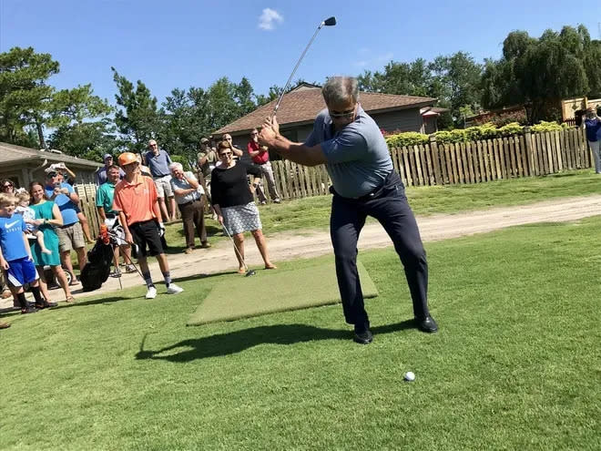 In this photo from July 2018, Wilmington Mayor Bill Saffo tees off for the first time at the newly reopened Inland Greens Golf Course, which the city purchased and renovated for public use.