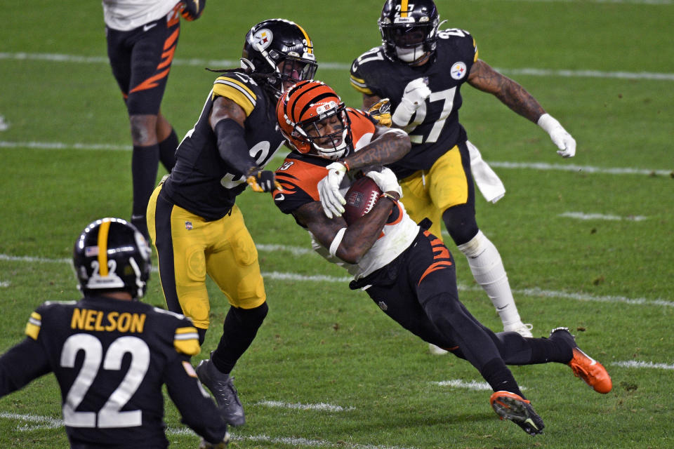 Cincinnati Bengals wide receiver Auden Tate (19) is tackled by Pittsburgh Steelers strong safety Terrell Edmunds (34) during the first half of an NFL football game in Pittsburgh, Sunday, Nov. 15, 2020. (AP Photo/Don Wright)