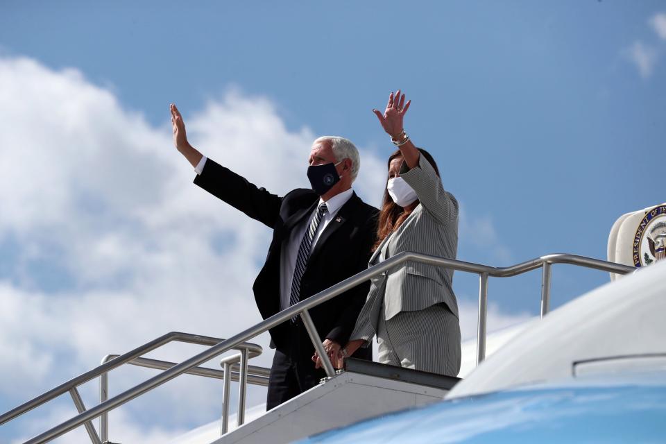 Vice President Mike Pence and second lady Karen Pence disembark Air Force II at the Indianapolis International Airport in July ahead of a meeting with education leaders about safely reopening schools amid the coronavirus pandemic.