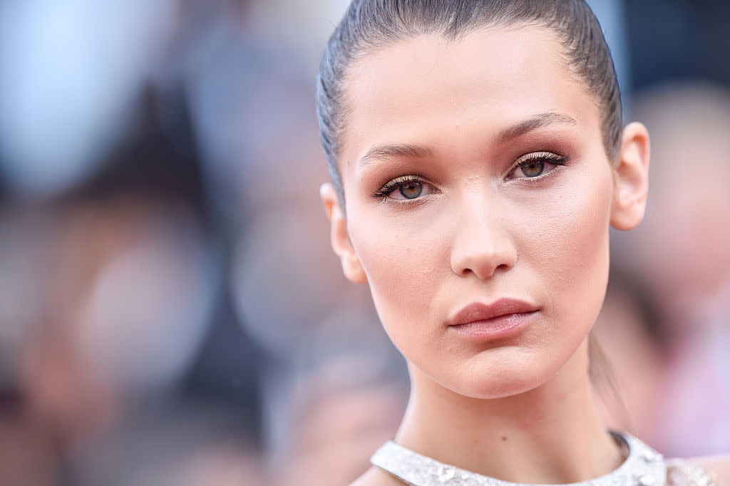 Bella Hadid skips the pants — but adds a fur jacket — so it all balances out