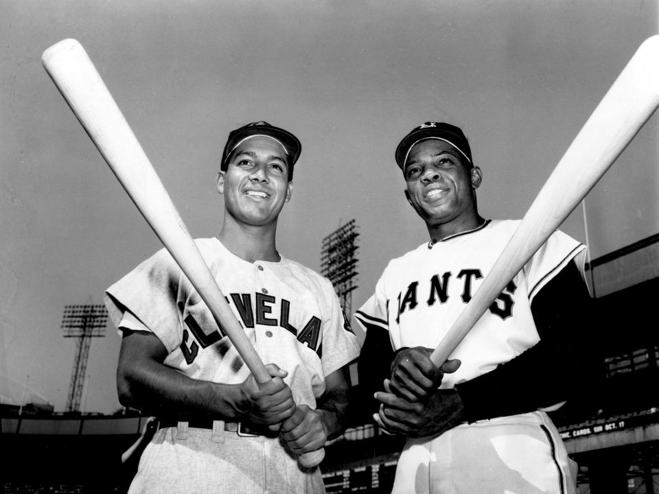 FILE - Batting champions Bobby Avila, left, of the Cleveland Indians, and Willie Mays, of the New York Giants, pose with their bats at the Polo Grounds in New York on Sept 28, 1954. The World Series opener is scheduled for Sept. 29. Mays, the electrifying “Say Hey Kid” whose singular combination of talent, drive and exuberance made him one of baseball’s greatest and most beloved players, has died. He was 93. Mays' family and the San Francisco Giants jointly announced Tuesday night, June 18, 2024, he had “passed away peacefully” Tuesday afternoon surrounded by loved ones. (AP Photo, File)