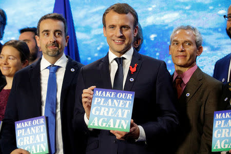 French President Emmanuel Macron attends the "Tech for Planet" event at the "Station F" start up campus ahead of the One Planet Summit in Paris, France, December 11, 2017. REUTERS/Philippe Wojazer