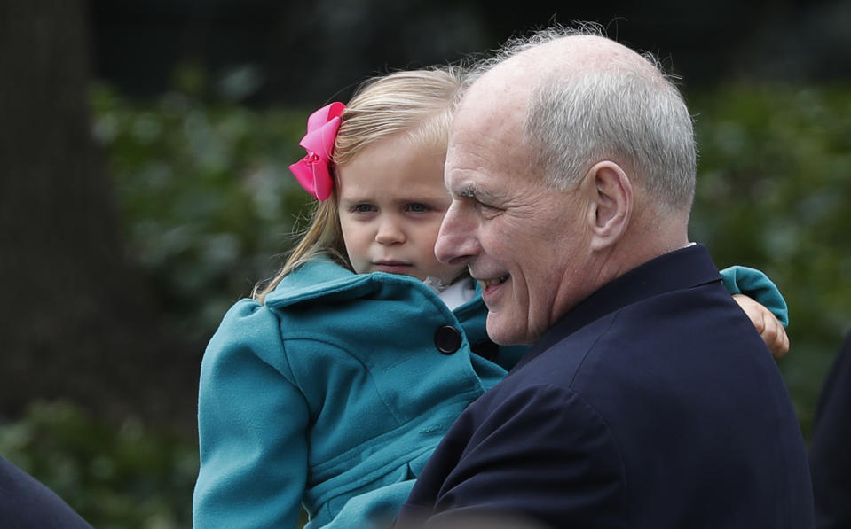 <p>White House Chief of Staff John Kelly holds a young girl in his arms during the annual White House Easter Egg Roll on the South Lawn of the White House in Washington, U.S., April 2, 2018. (Photo: Carlos Barria/Reuters) </p>