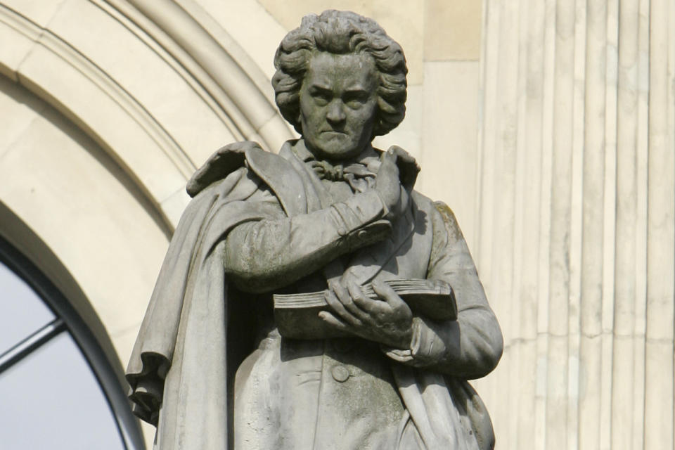 FILE - A statue of Ludwig van Beethoven stands outside the opera house in Hannover, Germany on Monday, Aug. 31, 2009. Hundreds of years after his death, researchers have pulled DNA from strands of his hair — and found clues about what killed him, according to a study published Wednesday March 22, 2023. (AP Photo/Joerg Sarbach, File)