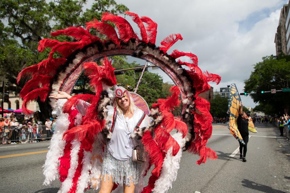 Groups and organizations take to Monroe Street tossing candy and beads as they participate in the annual Springtime Tallahassee parade Saturday, April 1, 2023.