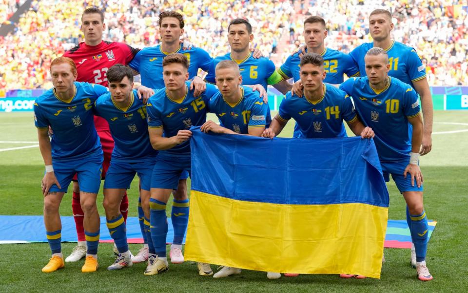 The Ukrainian squad pose before their group opener against Romania at Euro 2024