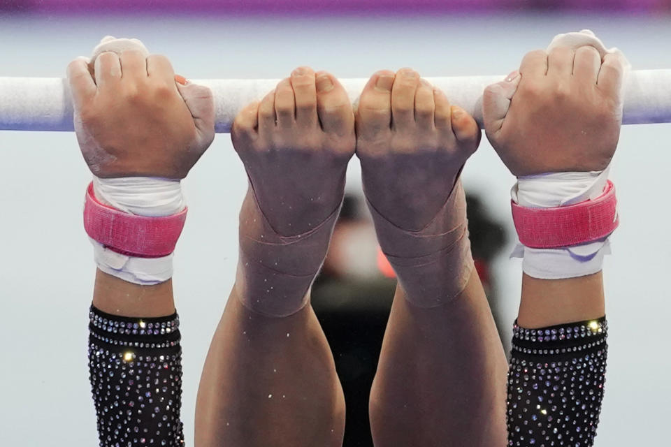 Yun Boeun of South Korea competes on the uneven bars at the women's team artistic gymnastics event of the 19th Asian Games in Hangzhou, China, Monday, Sept. 25, 2023. (AP Photo/Aaron Favila)