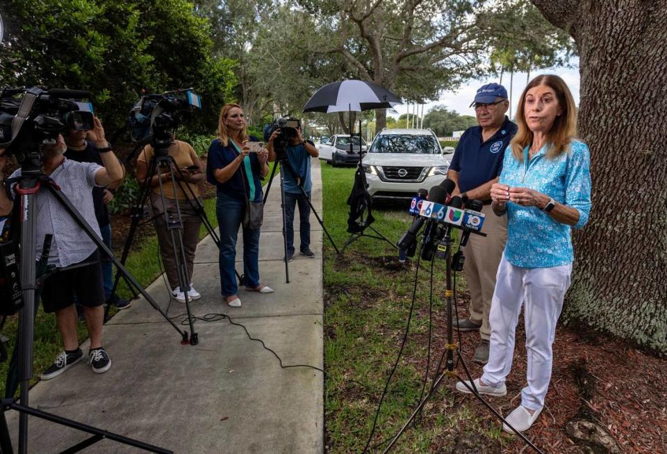 Parkland, Florida - July 5, 2023 - Linda Beigel Schulman, right, mother of geography teacher and cross country track coach Scott Beigel who died in the shooting in 2018 and her husband and Scott Beigel’s step-father Michael Schulman, talk to the press after they visited the Freshman building where her son died. Family members of the shooting victims at Marjory Stoneman Douglas High School visited the scene of the crime. The building will be demolished now that the trials are over.