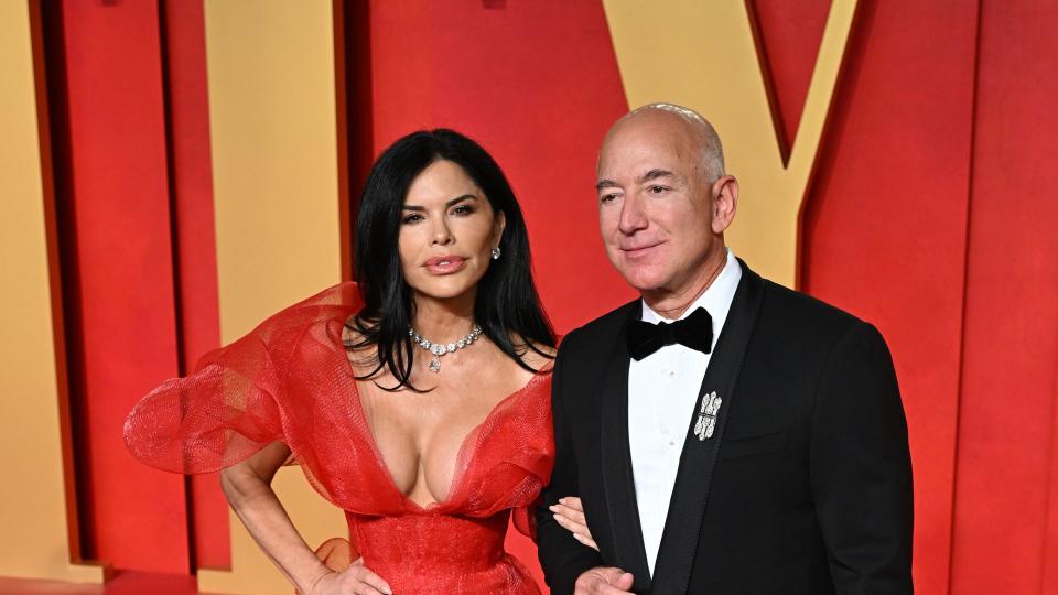 Lauren Sanchez and Jeff Bezos attending the Vanity Fair Oscar Party 
