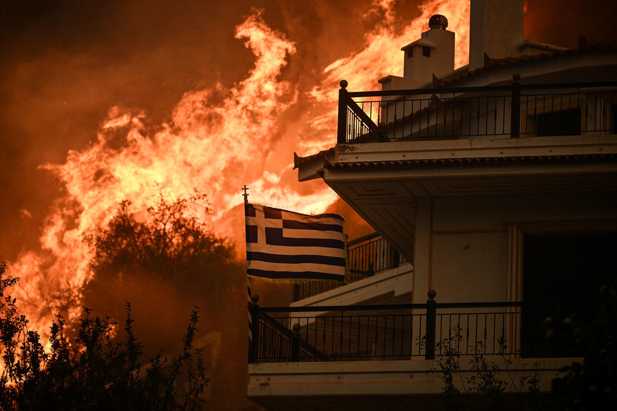 Greece Fire ANGELOS TZORTZINIS/AFP via Getty Images