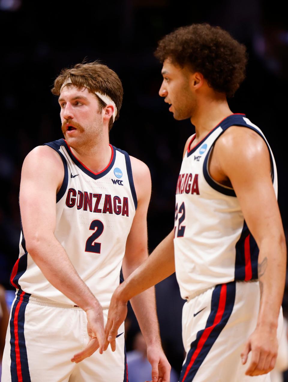 Gonzaga Bulldogs forward Drew Timme (2) and forward Anton Watson (22) celebrate after a play during the first half against the Grand Canyon Antelopes at Ball Arena in Denver on March 17, 2023.