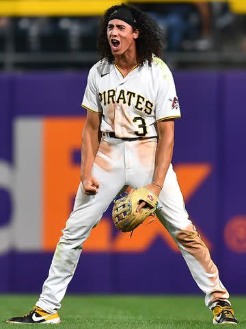 <p>Joe Sargent/Getty</p> Cole Tucker playing shortstop for the Pittsburgh Pirates.