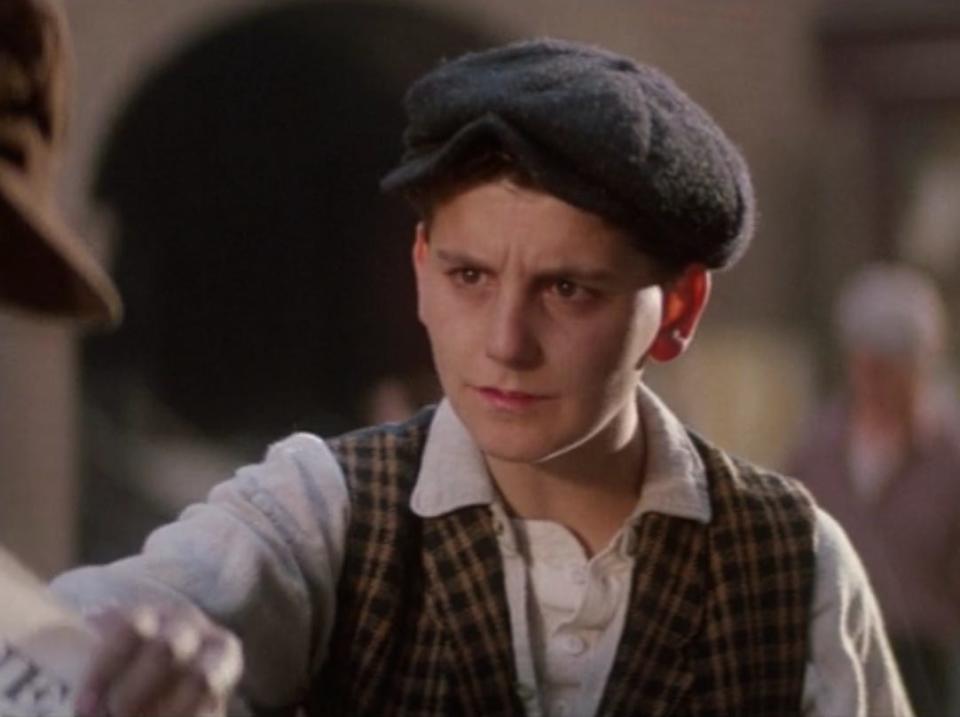 Max Casella in a hat and vest as Racetrack Higgins in "Newsies."