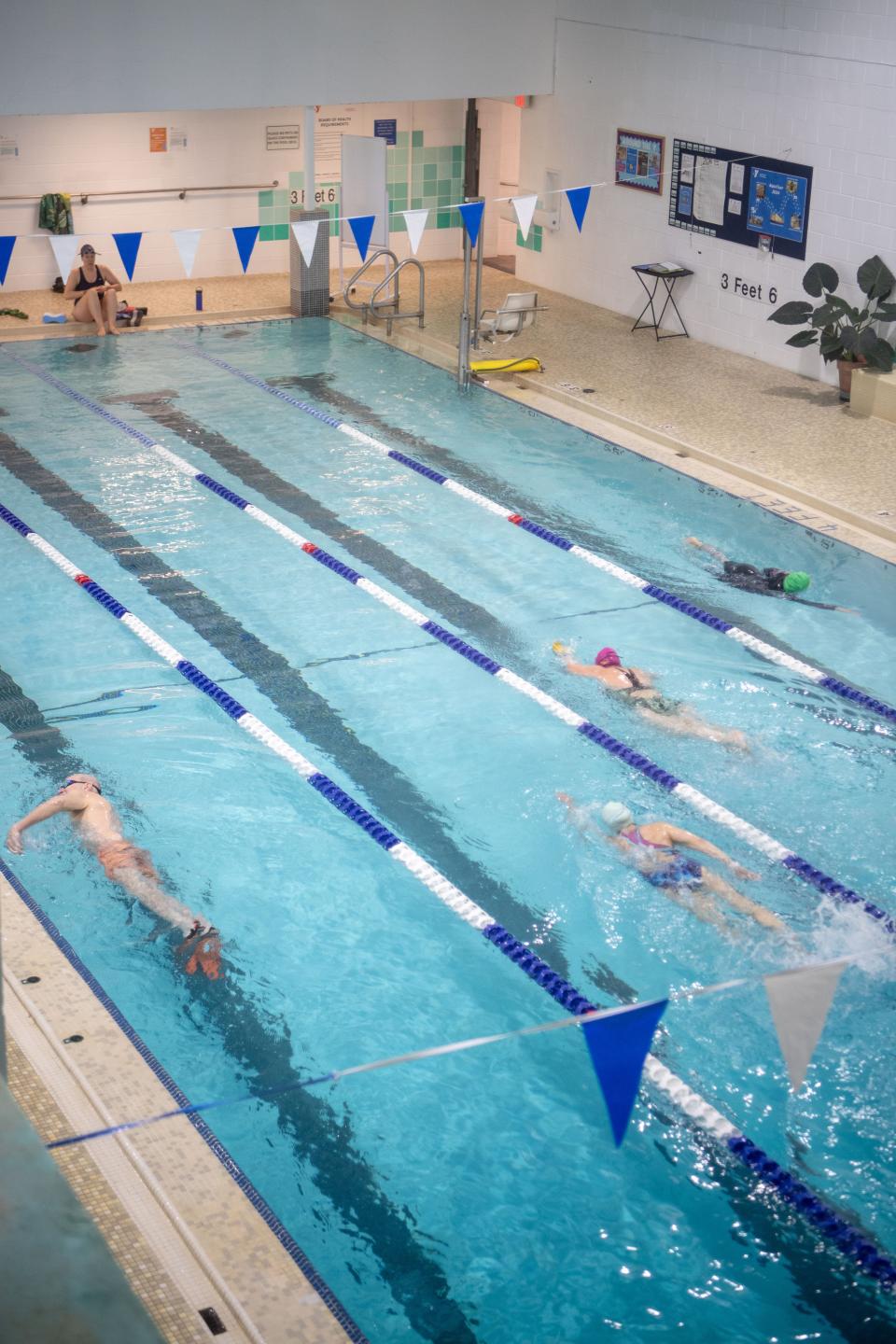 Swimmers perform laps in the pool at the YMCA, March 29, 2024.