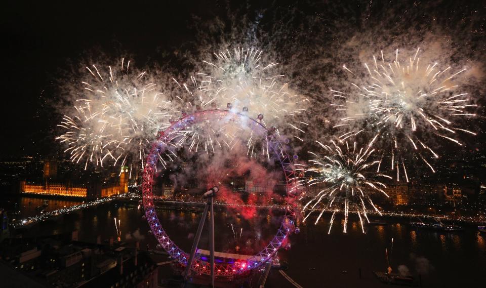 LONDON, ENGLAND - JANUARY 01: Fireworks light up the London skyline and Big Ben just after midnight on January 1, 2013 in London, England. Thousands of people lined the banks of the River Thames near Parliament in central London to herald the start of 2013. (Photo by Oli Scarff/Getty Images)