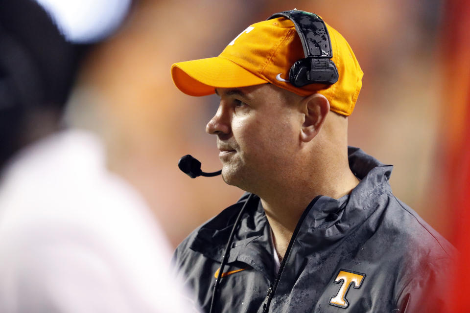 Tennessee head coach Jeremy Pruitt watches action in the first half of an NCAA college football game against Vanderbilt Saturday, Nov. 30, 2019, in Knoxville, Tenn. (AP Photo/Wade Payne)