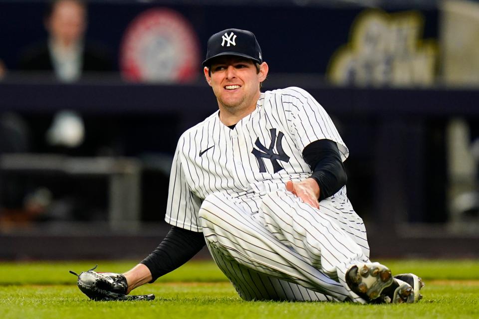 New York Yankees starting pitcher Jordan Montgomery reacts after being hit by a line drive off of Boston Red Sox's Xander Bogaerts during the first inning of a baseball game, Sunday, April 10, 2022, in New York. (AP Photo/Frank Franklin II)