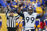 FILE - Virginia wide receiver Keytaon Thompson celebrates after making a touchdown catch against Pittsburgh during the first half of an NCAA college football game Saturday, Nov. 20, 2021, in Pittsburgh. The Fenway Bowl and Military Bowl have been canceled due to the pandemic as coronavirus outbreaks at Virginia and Boston College forced them to call off their postseason plans. The game scheduled for Fenway Park was to pit the Cavaliers against SMU on Wednesday, Dec. 29. (AP Photo/Keith Srakocic, File)