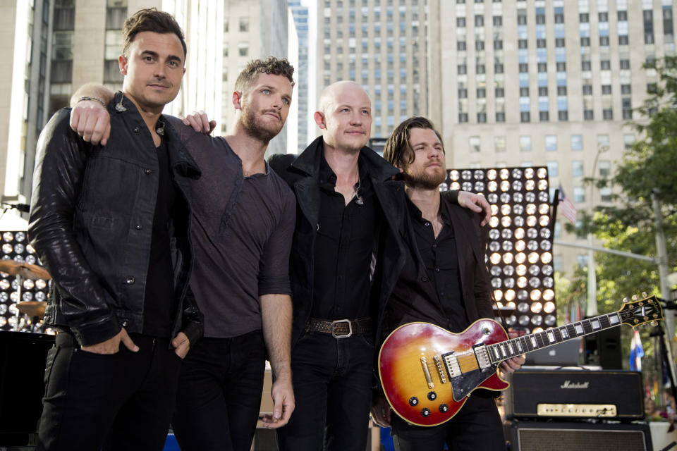 FILE - This Aug. 13, 2012 file photo shows members of The Fray, from left, Joe King, from left, Ben Wysocki, Isaac Slade and Dave Welsh on NBC's "Today" show in New York. After listening to “Need a Girl By Friday,” King said that U2 frontman Bono told him in an email: “I need a song like this every Friday.” “It's just encouraging to get that kind of response from people you respect and look up to,” King said. His relationship with the band started a few years ago when The Fray opened up for U2 during their last tou (Photo by Charles Sykes/Invision/AP, file)