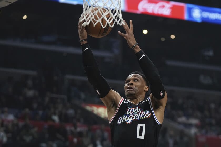 Los Angeles Clippers guard Russell Westbrook shoots during the first half of an NBA basketball game against the Sacramento Kings Friday, Feb. 24, 2023, in Los Angeles. (AP Photo/Mark J. Terrill)