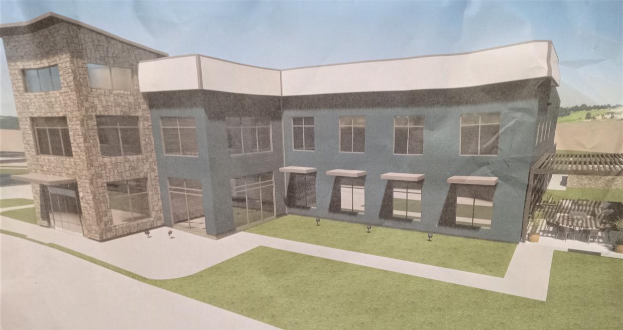 A drawing of the proposed new Holmes General Health District building, by Tekton Engineering of Berlin Township, is on display in the Holmes County commissioners meeting room.