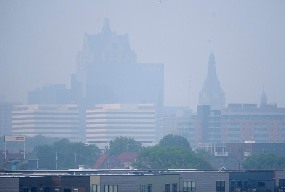 A haze of smoke hovers in the air over the Milwaukee skyline on Tuesday, June 27. The area is again under an air quality advisory due to smoke from Canadian wildfires.