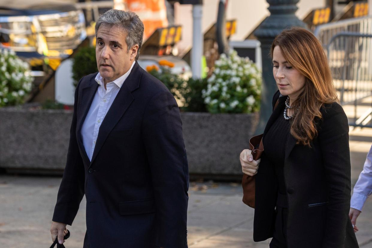 Michael Cohen arrives at the courthouse for day two of his testimony (AP)