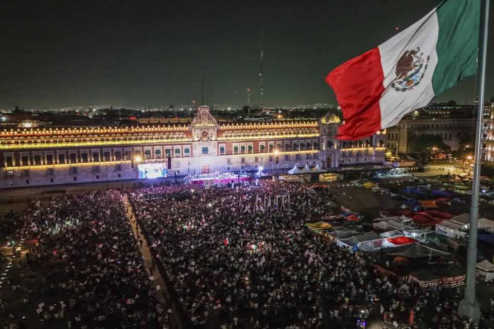 President-elect Claudia Sheinbaum addresses supporters at the Zocalo, Mexico City's main square, after the National Electoral Institute announced she held an irreversible lead in the election, early Monday, June 3, 2024. (AP Photo/Matias Delacroix)