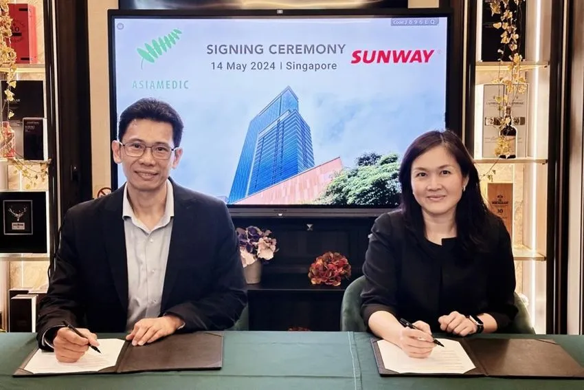 Mr Arifin Kwek, Chief Executive Officer of AsiaMedic Limited and Ms Sarena Cheah, Executive Director of Sunway Berhad [L-R]