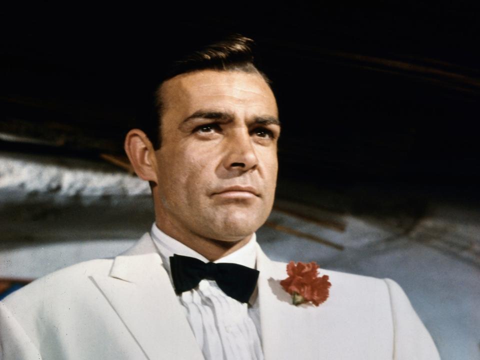 <p>Style and substance: as the secret agent in 1964’s ‘Goldfinger’</p> (Bettmann Archive via Getty)