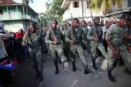 Members of the Haitian Armed Forces (FAD'H) parade in the streets of Cap-Haitien, Haiti, November 18, 2017. REUTERS/Andres Martinez Casares