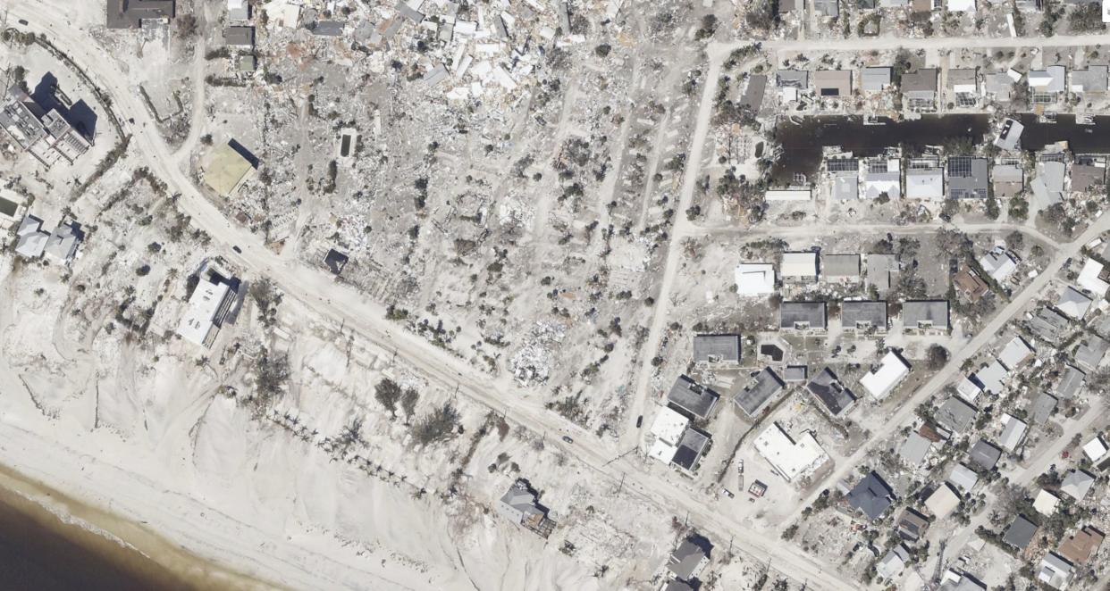 This satellite map provided by NOAA shows damage from Hurricane Ian to Red Coconut RV Resort in Fort Myers Beach, Fla, on Saturday, Oct. 1, 2022.