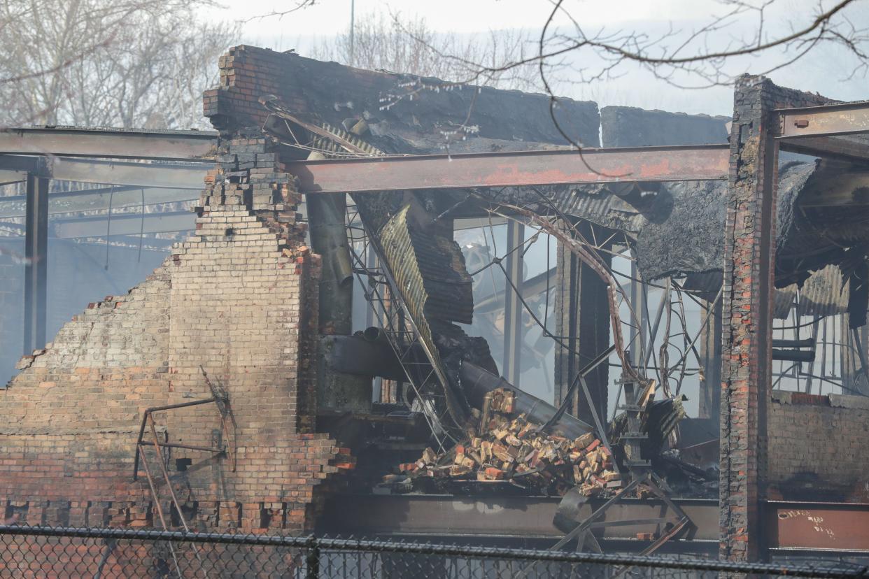 Akron firefighters on the scene of a fire at the former American Rubber & Tire Co. Plant at the dead end of Beech Street on Thursday. The fire consumed the entire three-story building, which also housed Ace Rubber Products.