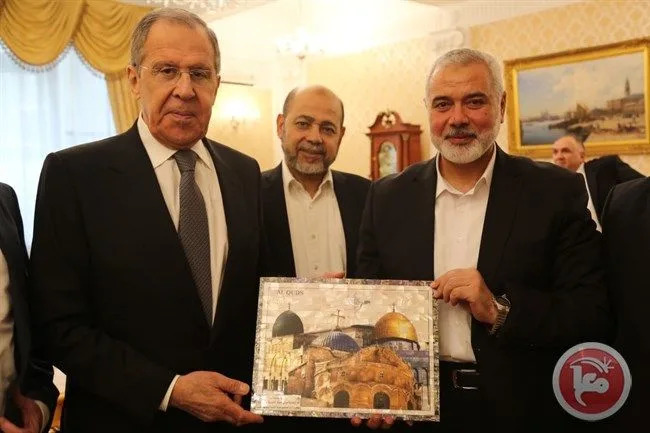 A photo of Russian Foreign Minister Sergey Lavrov (L) with with the head of the Political Bureau of Hamas terorrist group Ismail Haniyeh (R) and a senior Hamas member Musa Abu Marzouk (C) in March 2020, during a meeting in Moscow. (Russian Representitive Office in Palestine / X)