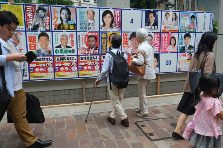 Japanese voters are suspicious of the government's economic policies and don't trust controversial plans to change the pacifist constitution -- but they are still expected to hand Prime Minister Shinzo Abe's coalition victory in parliamentary polls