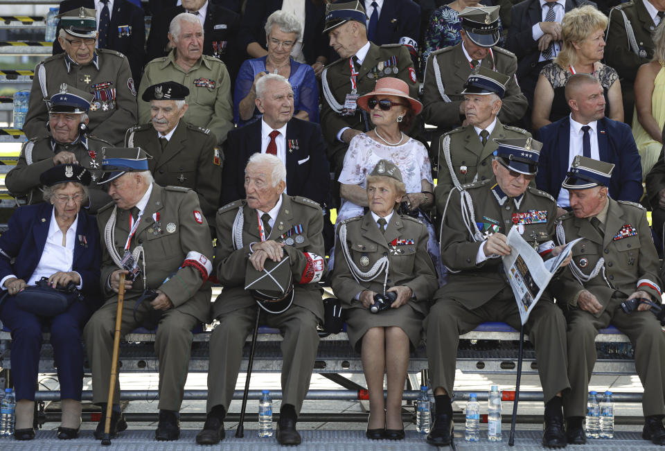 Polish war veterans wait before a memorial ceremony marking the 80th anniversary of the start of World War II in Warsaw, Poland, Sunday, Sept. 1, 2019. (AP Photo/Petr David Josek)