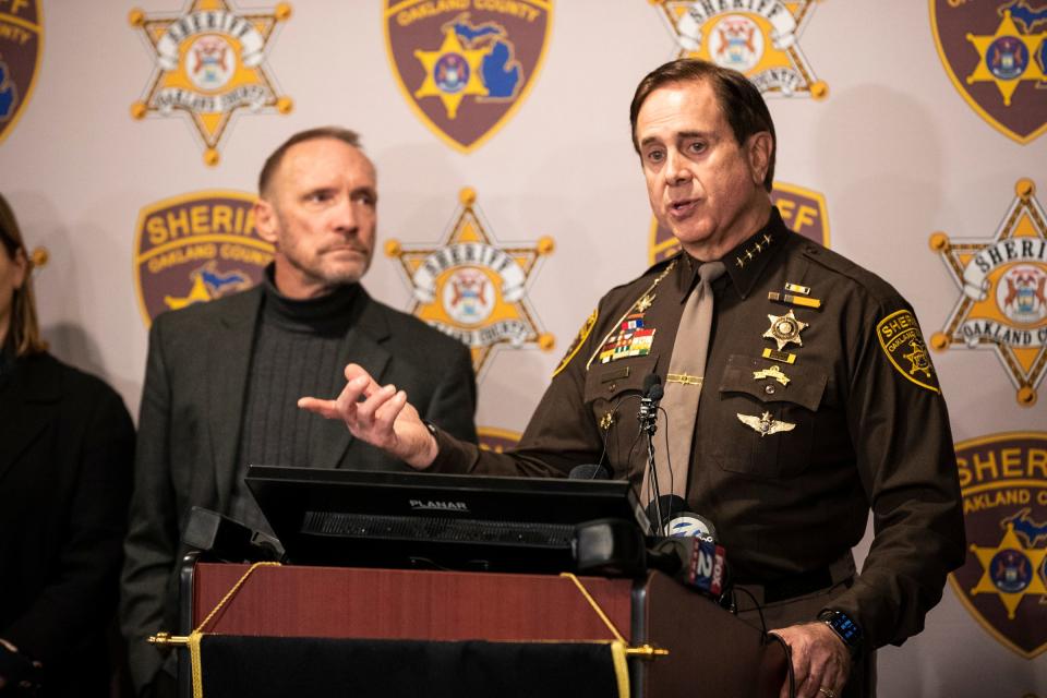 Oakland County Sheriff Michael Bouchard, right, speaks next to county executive David Coulter during a press briefing on the Oxford High School shooting at Oakland County Sheriff’s office in Pontiac, Mich., on Tuesday.