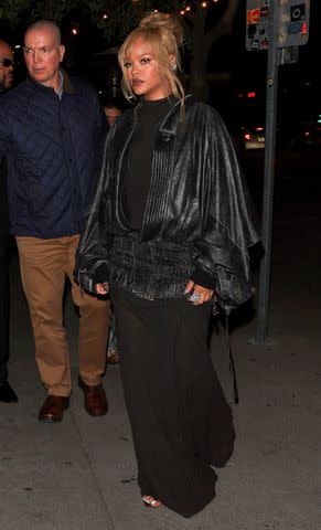 <p>Backgrid</p> Rihanna wore an all-black look to a charity dinner in West Hollywood Monday