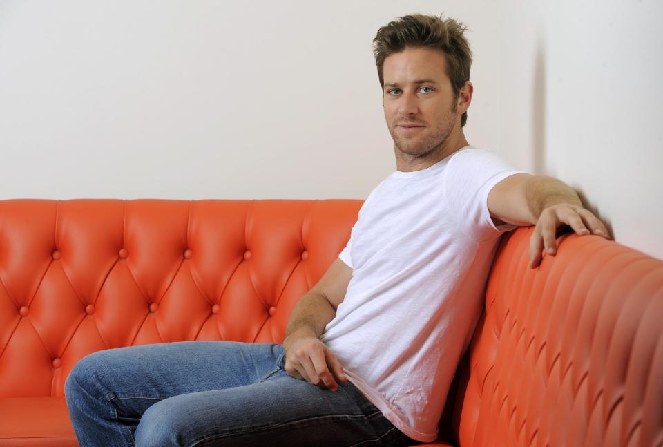 In this Monday, June 10, 2013 photo, actor Armie Hammer poses for a portrait at the Pacific Design Center in West Hollywood, Calif. Hammer takes on his first major leading-man role opposite Johnny Depp in “The Lone Ranger.” The movie releases July 3, 2013. (Photo by Chris Pizzello/Invision/AP)