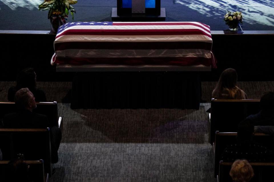 The coffin of late US Marine is displayed for his family and others to honor.