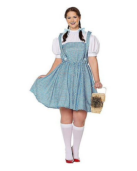 Model wears Adult Dorothy Plus Size Costume with gingham dress and red shoes