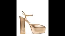 <p><strong>Stuart Weitzman </strong></p><p><strong>$575.00</strong></p><p>Want to add a touch of heigh to your cocktail attire? We suggest these warm gold platform pumps that have an ankle strap for extra support.</p>