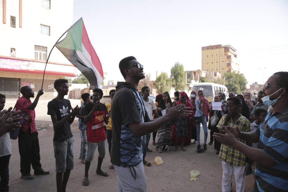 People chant slogans during a protest in Khartoum, amid ongoing demonstrations against a military takeover in Khartoum, Sudan, Thursday, Nov. 4, 2021. (AP Photo/Marwan Ali)