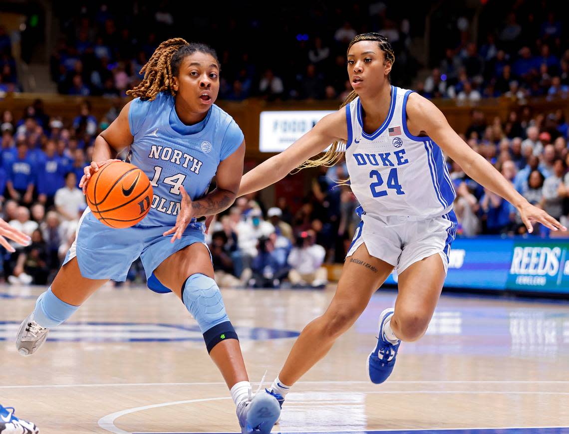 North Carolina’s Kayla McPherson pushes the ball past Duke’s Reigan Richardson during the second half of North Carolina’s 45-41 win over Duke on Sunday, Feb. 26, 2023, at Cameron Indoor Stadium in Durham, N.C.