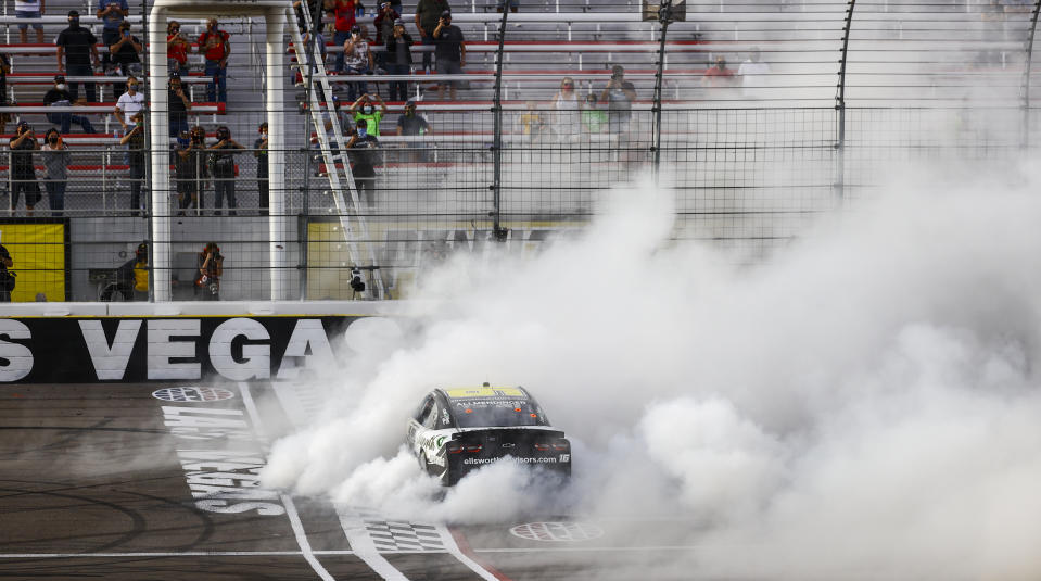 AJ Allmendinger does a burnout after winning a NASCAR Xfinity Series auto race at Las Vegas Motor Speedway, Saturday, March 6, 2021. (Chase Stevens/Las Vegas Review-Journal via AP)