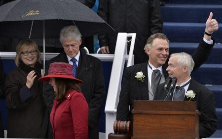 Virginia Governor Terry McAuliffe gives a thumbs up after finishing his inaugural address and being sworn in, in Richmond, Virginia, January 11, 2014. REUTERS/Mike Theiler