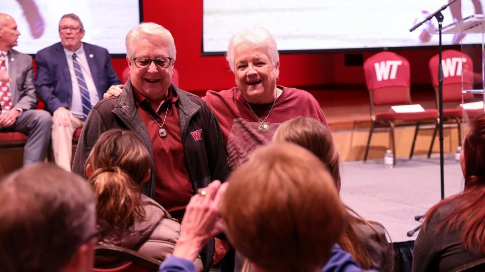 Judy Fugate, left center, and Cissy Bowers greet WT women's athletes at a press conference announcing Fugate's legacy gift of $1.8 million to support WT Athletics.