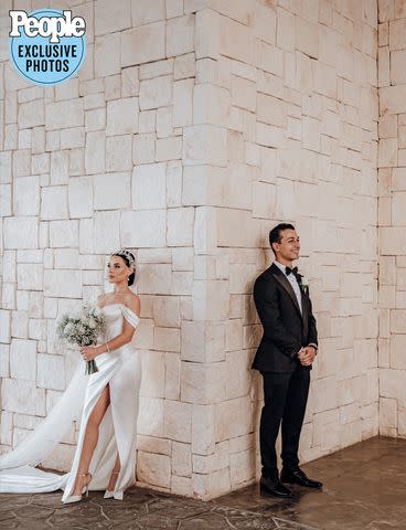 <p>Eduardo Mejia/Adventure Photos</p> Paul Karmiryan and Stella Mayilyan pose on their wedding day.