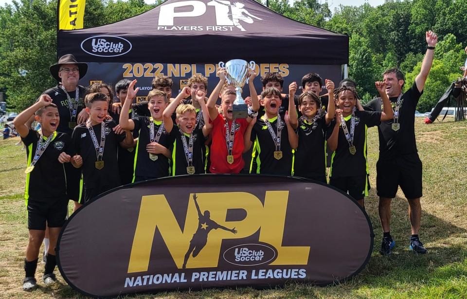 2009 Tallahassee Boys Florida Elite Soccer Academy celebrates with trophy after defeating Charleston 4-2 in NPL East Championship Game